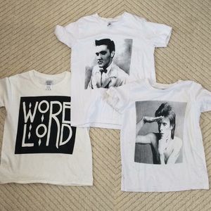 A lot of three band tees